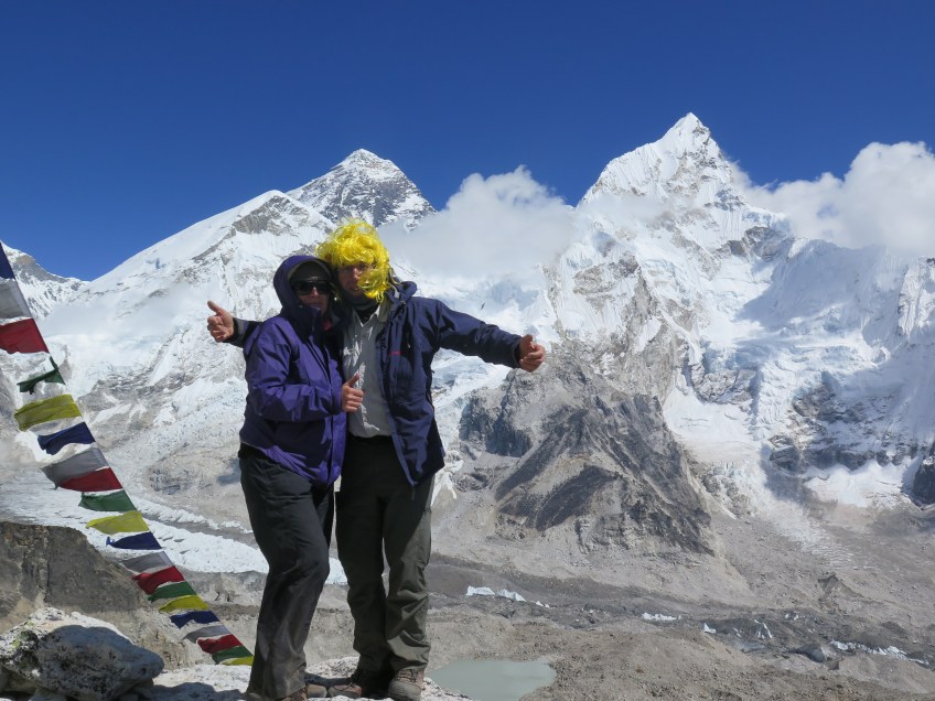 EBC Trekkers standing on Kala Patthar in front of Mount Everest and above Everest Base Camp