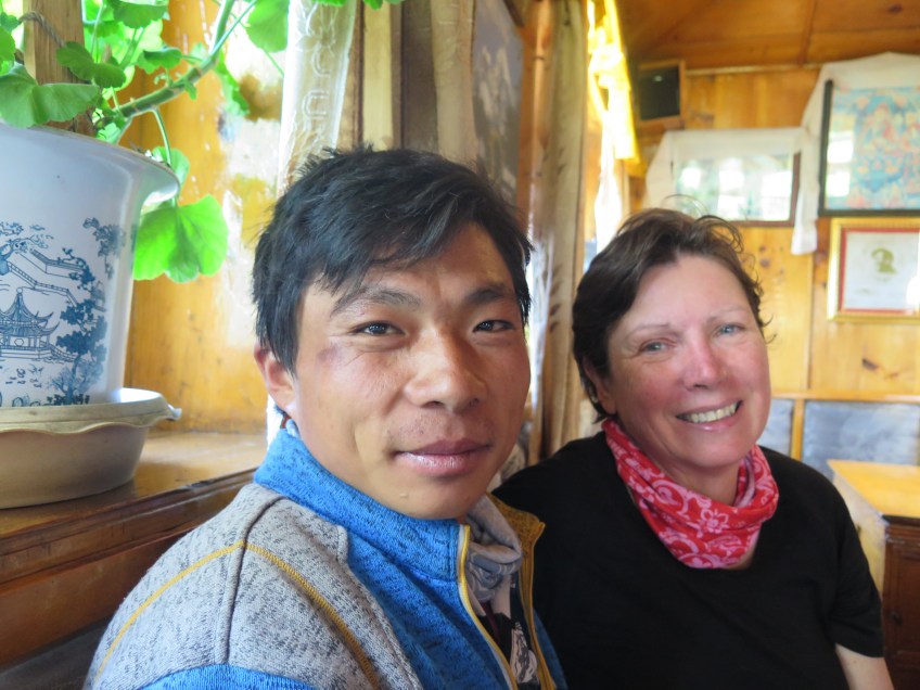 porter guide and trekker in nepal
